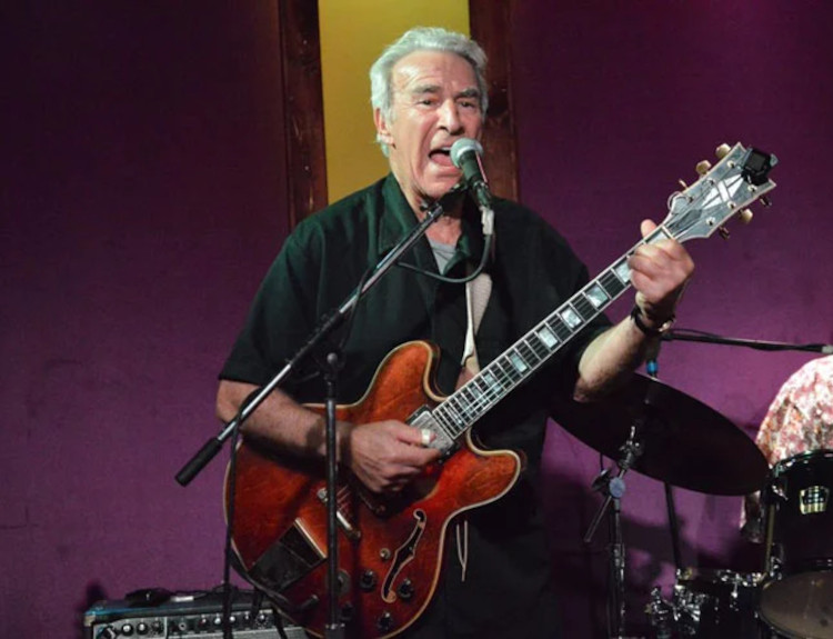 Bernie Pearl performing on stage