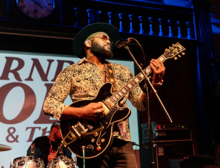 Darnell Cole performing on stage